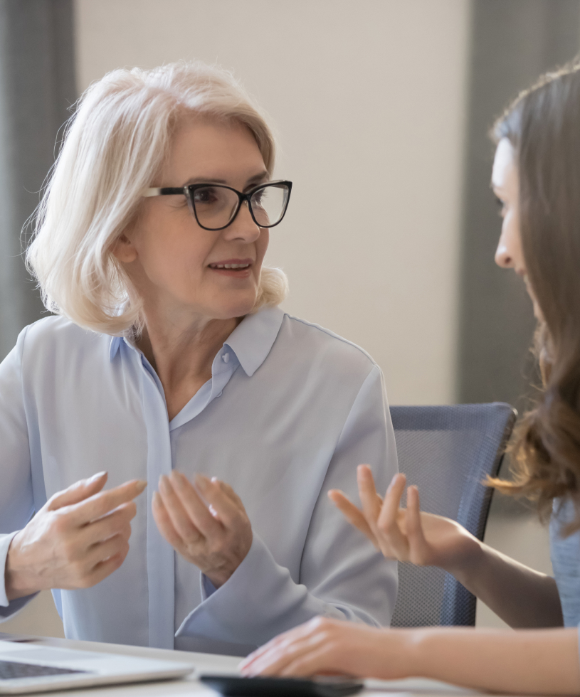 Elderly woman working with a financial planner