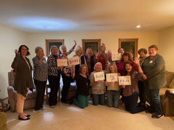 Chapter HX, Rossville, holding P.E.O. signs