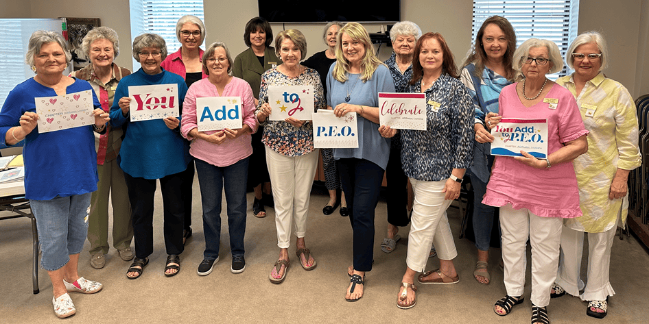 Chapter AO, Louisiana, holding You Add to P.E.O. signs