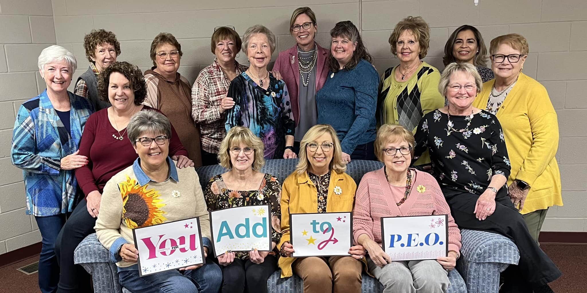 Chapter HR, Kansas, holding You Add to P.E.O. signs
