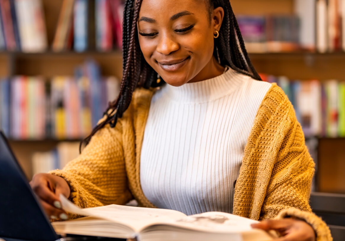 College student studying in a library