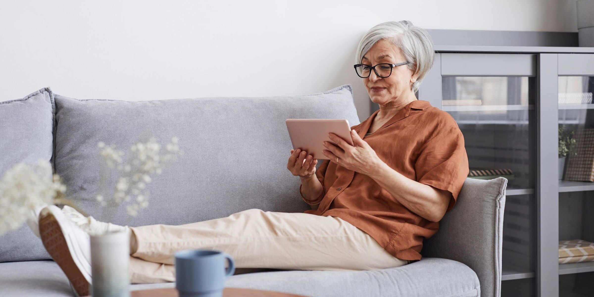 Modern Senior Woman Relaxing at Home