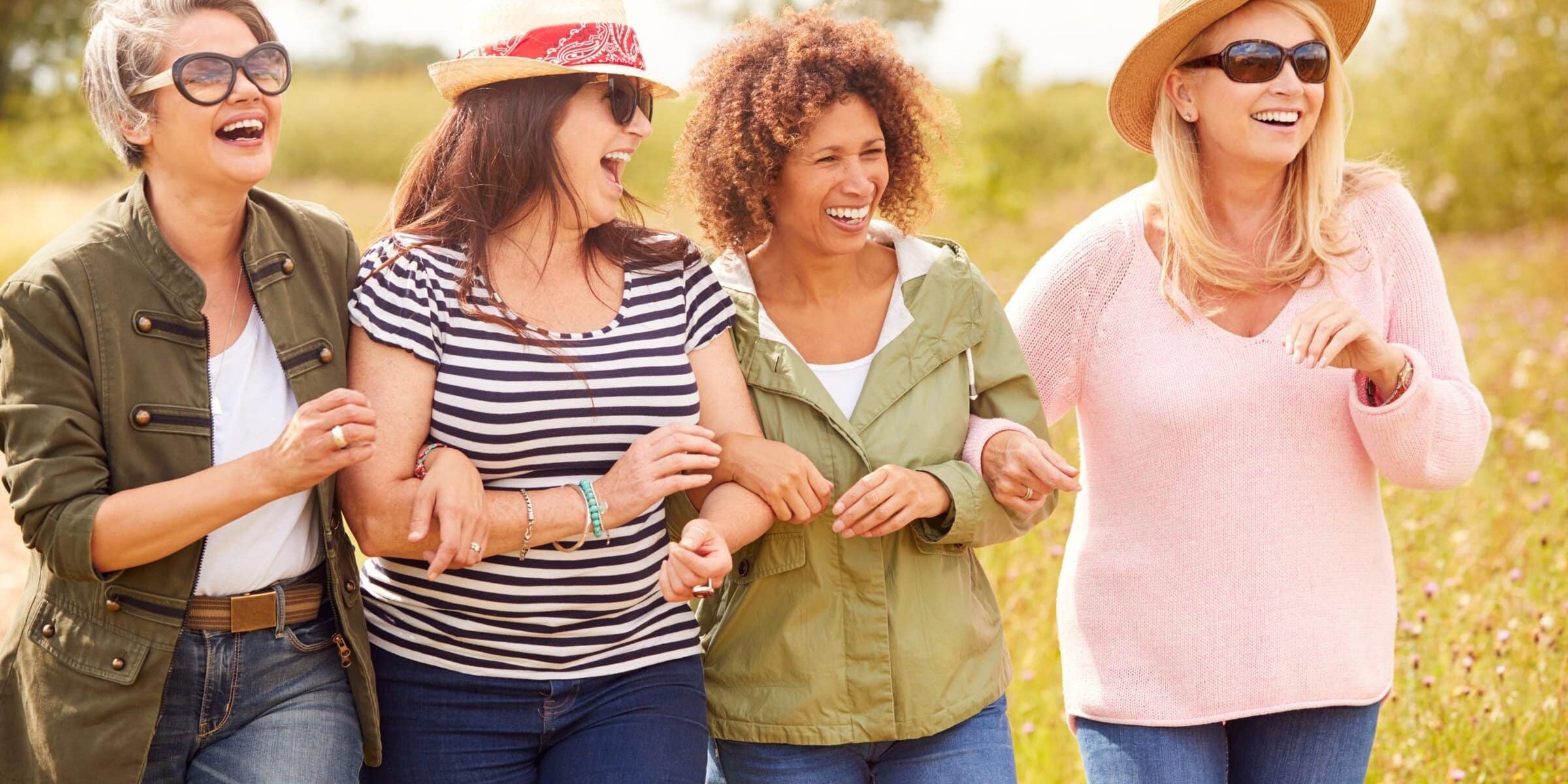 Group of women walking together and laughing