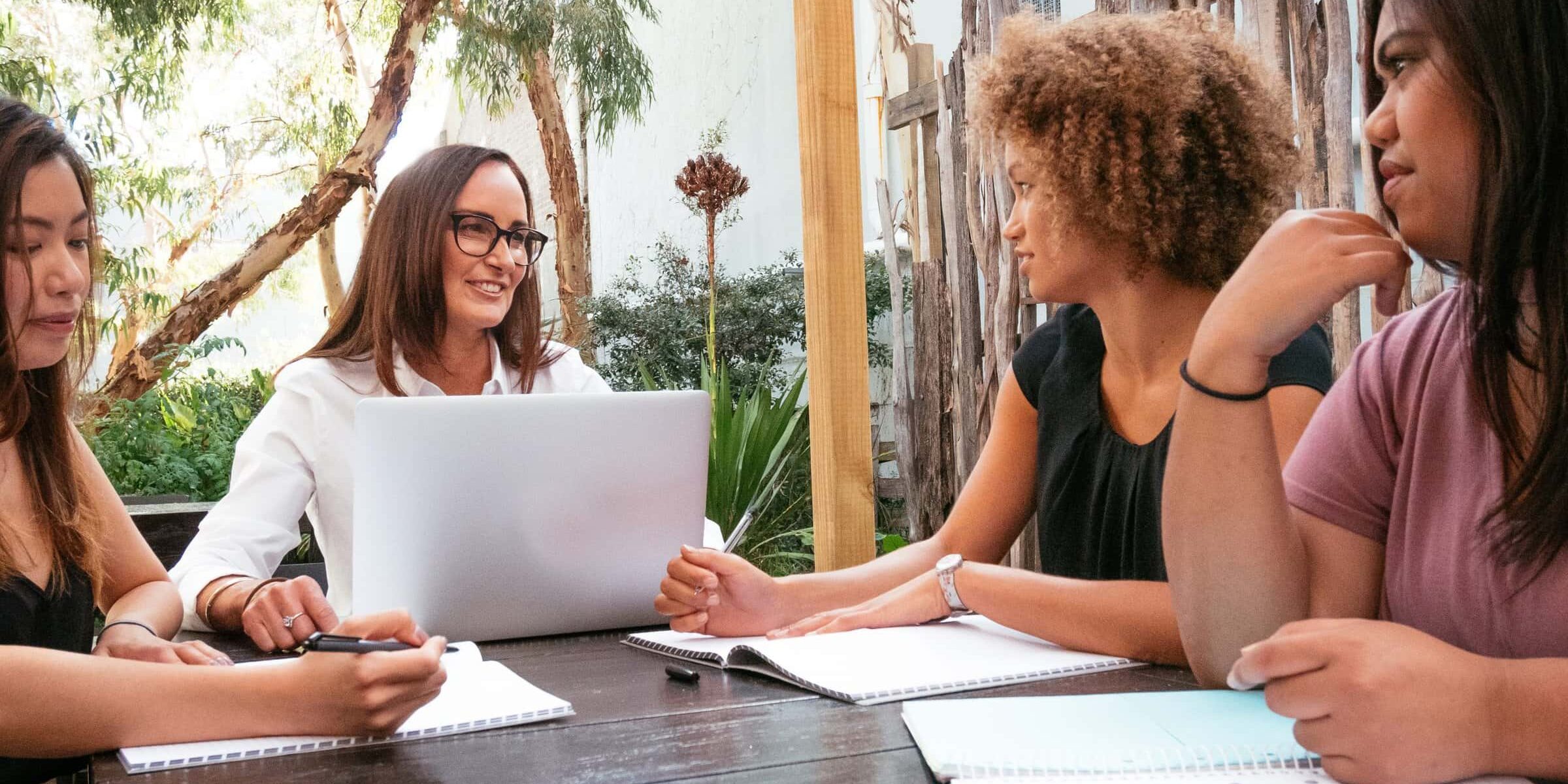 Group of women working together at home