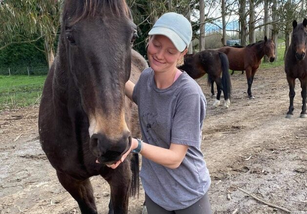 Michaela Brantley, Program for Continuing Education recipient, with her horse